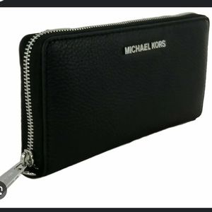 Gold and black Michael Kors wallet